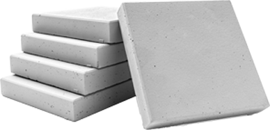 Square cement blocks stacked with one leaning