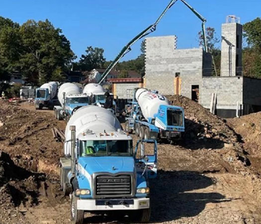 Salomone Redi-Mix Concrete Trucks on a Job Site